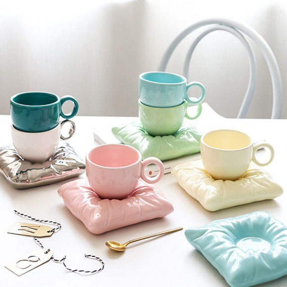 https://www.xmhouseware.com/wp-content/uploads/2021/01/Creative-macaron-pillow-bag-coffee-tiffany-cup-ice-cream-cup-nordic-ceramic-cup-1.jpg